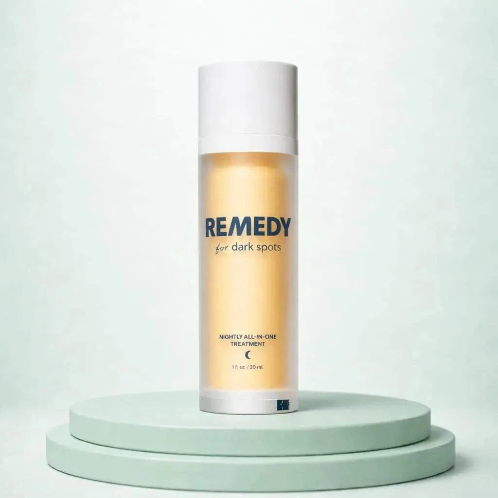 Dark spot serum bottle with dropper for skin brightening treatment
