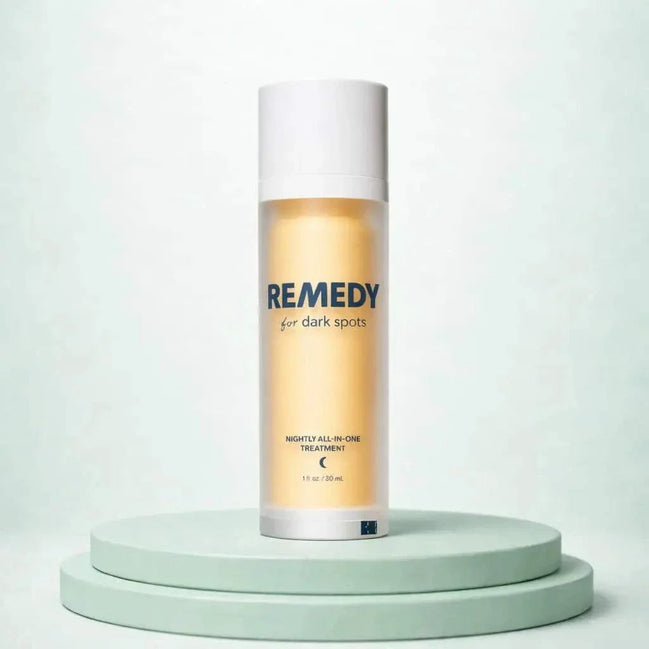 Dark spot serum bottle with dropper for skin brightening treatment