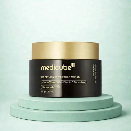 Deep Vita C Capsule Cream with golden vitamin capsules and gel texture